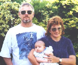 Picture of Ian and Brenda with Granddaughter, Riley
